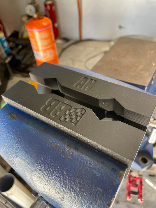 Bolt-on AN fitting soft jaws on a 5 inch vice